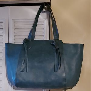 Jade tote, spacious and unique. Never used
